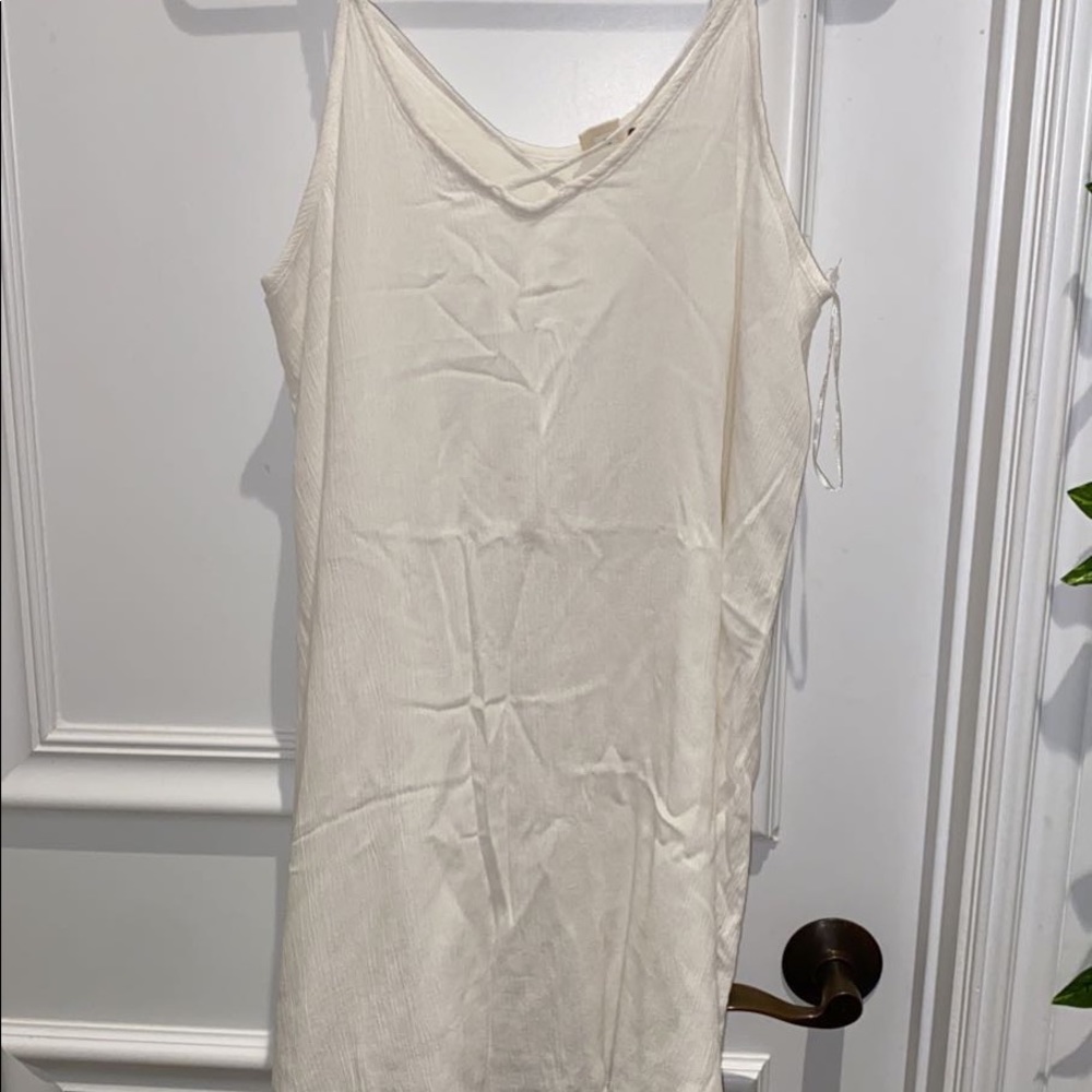 simple white dress bought at a surf shop